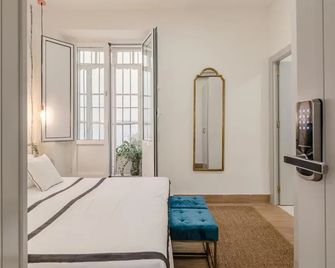 Santacruz Hostal Plaza - Seville - Bedroom