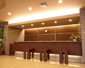 Hotel Route-Inn Iwata Inter - Iwata - Front desk
