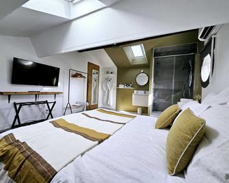 La Maison Grivolas Appartements et Maison d'hôtes - Aviñón - Habitación