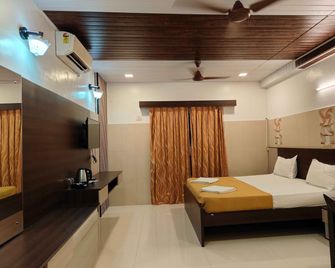 Park Inn Beach Resort - Chennai - Schlafzimmer