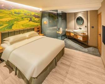 Qiankunrun Boutique Hotel (Meizhou Jiangbei) - Meizhou - Bedroom