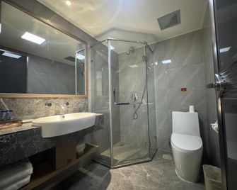 Yingkou Yudingyu Longge Business Hotel 1 (Wanda Plaza) - Yingkou - Slaapkamer