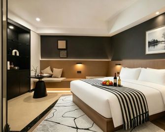 Orange Joy Hotel (Xiangya Hospital Branch, Wuyi Square) - Changsha - Schlafzimmer