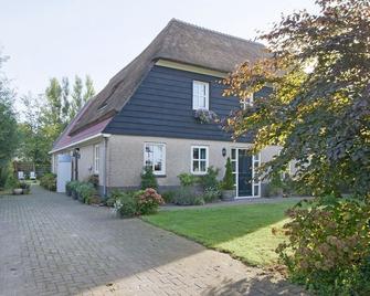 Apartment in Wieringer farmhouse. - Westerland - Gebäude