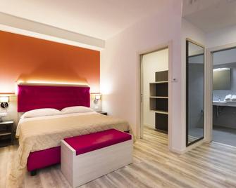 Alma Living Hotel - Venzone - Bedroom
