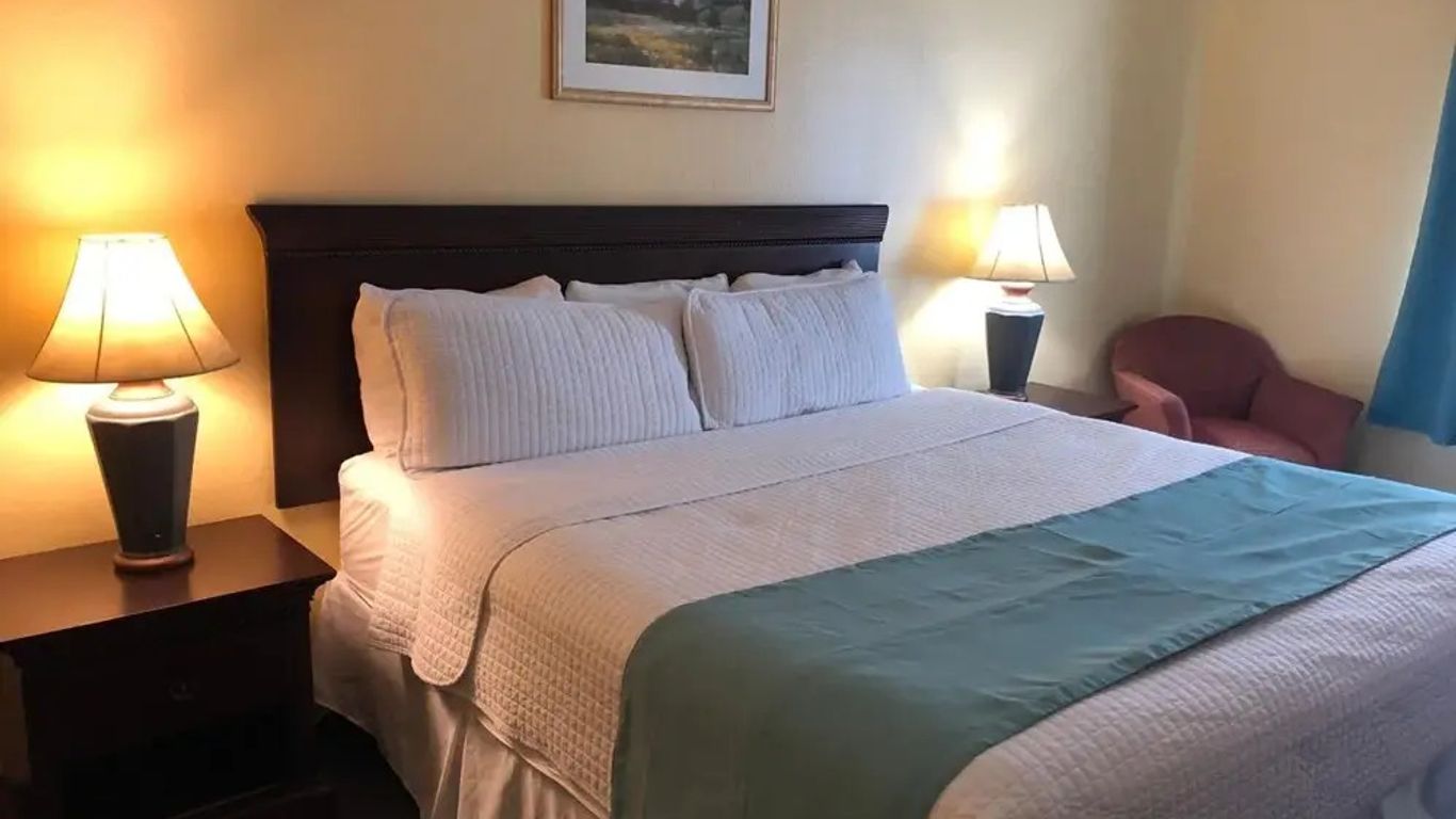 Deluxe 6 Inn & Suites