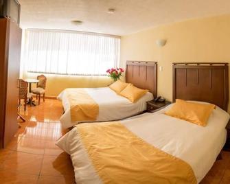 Hotel Saint Thomas - Quito - Schlafzimmer
