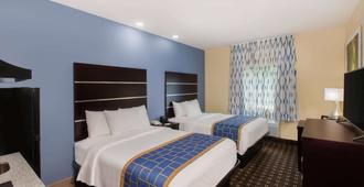 Days Inn by Wyndham Baton Rouge Airport - Baton Rouge - Bedroom