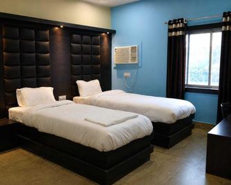 Spot on Hotel Bandhan & Marriage Hall - Daltonganj - Bedroom
