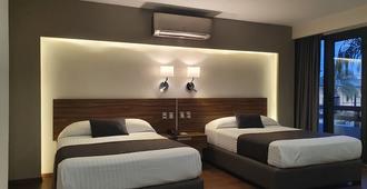 Estanza Hotel & Suites - มอเรเลีย - ห้องนอน