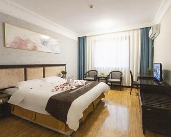 Tangshan Jingang International Hotel (Caofeidian Tanghai Road Branch) - Tchang-šan - Ložnice