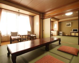 Hirasawaya Ryokan - Inawashiro - Essbereich