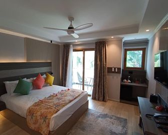 Crown Beach Hotel Seychelles - Au Cap - Schlafzimmer