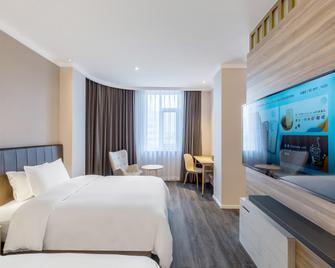 Hanting Premium Hotel Dongying Dongcheng - Dongying - Schlafzimmer