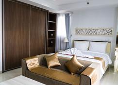 Azalea Suites Cikarang by Jayakarta Group - Cikarang - Habitación