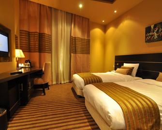 فندق الدار - الشارقة - غرفة نوم