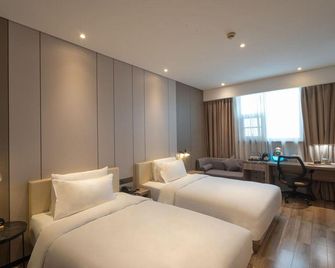 Xuzhou Pengcheng Square Riverside Hotel - Xuzhou - Soveværelse