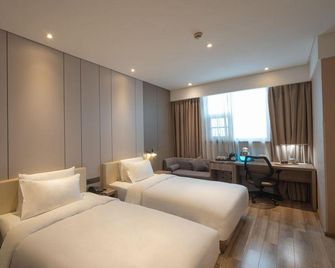 Xuzhou Pengcheng Square Riverside Hotel - Xuzhou - Habitación
