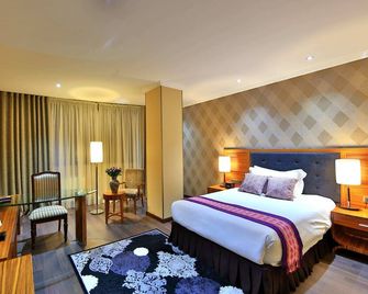 Damas International Hotel - Bishkek - Habitació