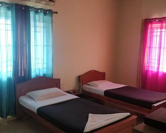 Tulip Suites - Coimbatore - Bedroom