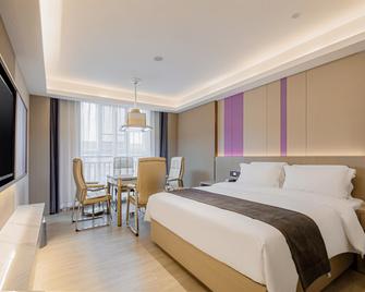 Lavande Hotel Yueyang County Fuya - Yueyang - Спальня