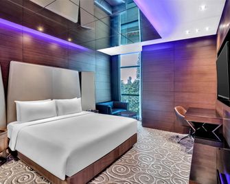 Radisson Blu Atria Bengaluru - באנגאלור - חדר שינה