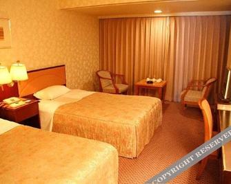 Aomori Grand Hotel - Аоморі - Спальня