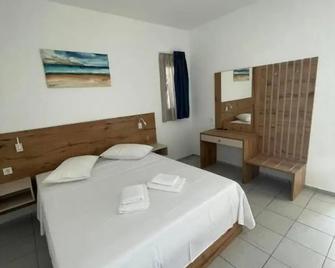 Coralli Beach Hotel - Kokkini Hani - Спальня