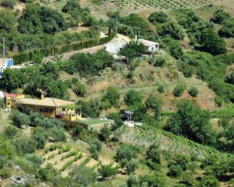 Villa única con piscina privada y vistas a la montaña. - Cartajima - Vista del exterior