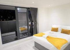 Queens Luxury Apartments - Londen - Slaapkamer