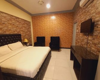 Travel Inn islamabad - Islamabad - Schlafzimmer