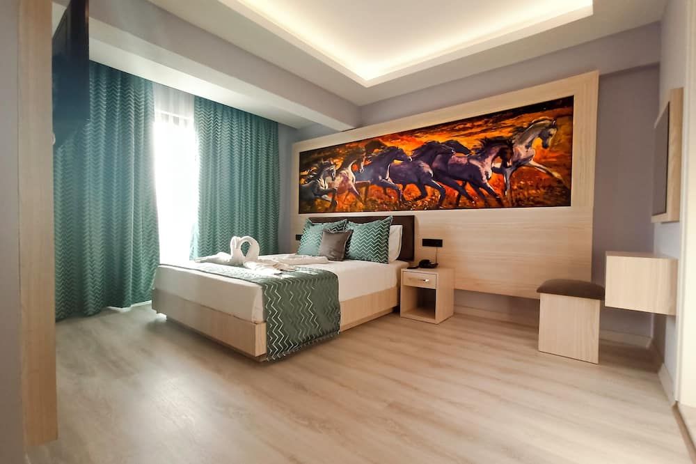 Livaneli Boutique Otel - אלניה - חדר שינה