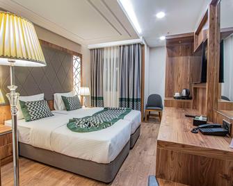 United Hotel International - יאונדה - חדר שינה