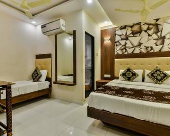 Guest Inn Residency - Mumbai - Bedroom