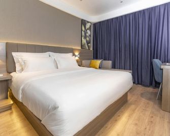 7 Days Premium (Zibo Zichuan Hongtai) - Zibo - Schlafzimmer