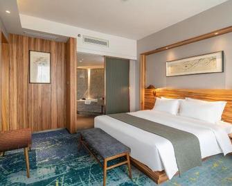 Yuanfei Hotel - Weifang - Bedroom
