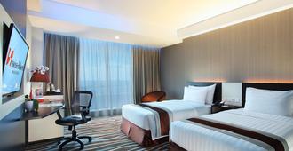 Swiss-Belhotel Makassar - מקאסר - חדר שינה