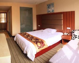 Qiaojiayuan Hotel - Shiyan - Schlafzimmer