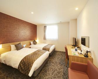 Sakura Garden Hotel - Osaka - Slaapkamer