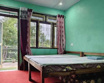 Ma Kokila Homestay - Munsyari - Bedroom
