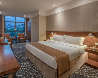Days Inn by Wyndham Chongqing Guangyu Shangbin - Chongqing - Soveværelse