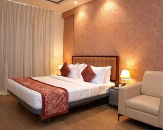 Grand Country Stays - Bangalore International Airport Road - Devanhalli - Bedroom