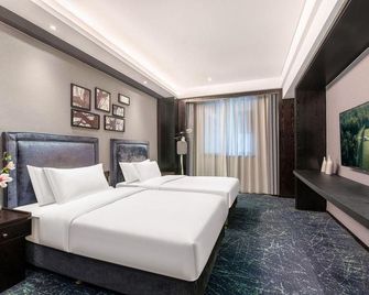 lanting fashionable hotel - Jiaozuo - Slaapkamer