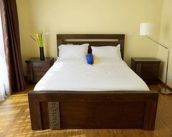 Royal Pine Cottage Hotel - Ruiru - Habitación