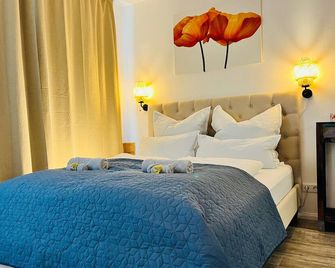 Aycatcherhomes - Top Lage I Zentral I Altstadt Marburg I Nähe Fluss Lahn I Wlan I Parterre Boutique Apartment Orion - Marburg - Slaapkamer