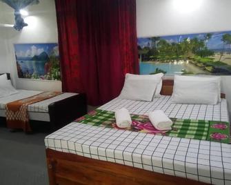 Erandi Holiday Home - Gampaha - Slaapkamer