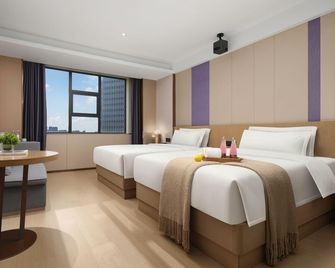 Lavande Hotel (Xiangtan Xiangxiang Hotel) - Xiangtan - Bedroom