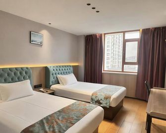 Sunshine 100 Hotel (Jiangnan Park Branch) - Jilin - Bedroom