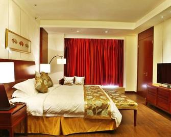 Howard Johnson by Wyndham Huaihai Resort Lushan - Jiujiang - Habitación