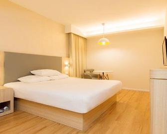 Jiuzhou Lu Hotel Tianjin - Tianjín - Habitación
